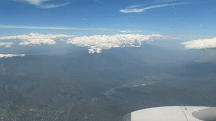 Aerial view captures snow-capped mountains over North Macedonia