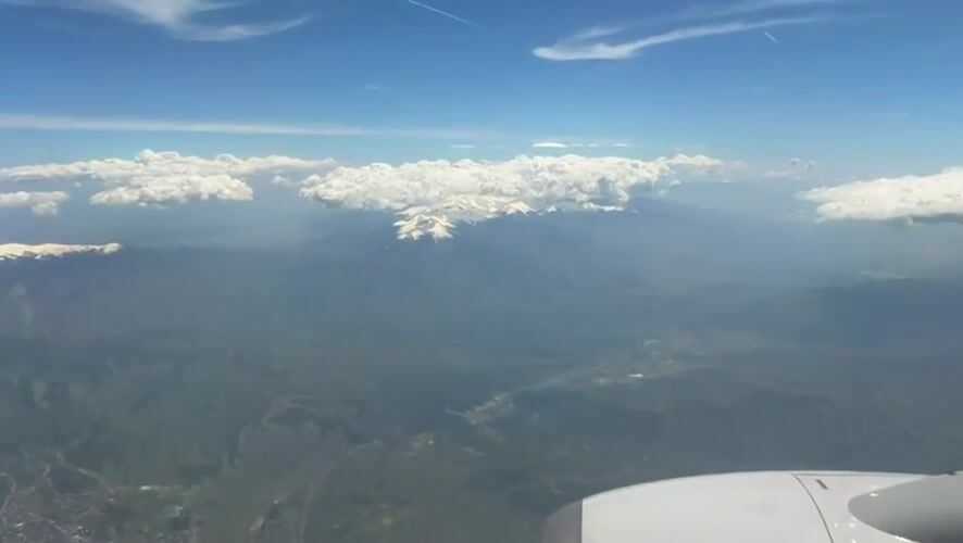 Aerial view captures snow-capped mountains over North Macedonia