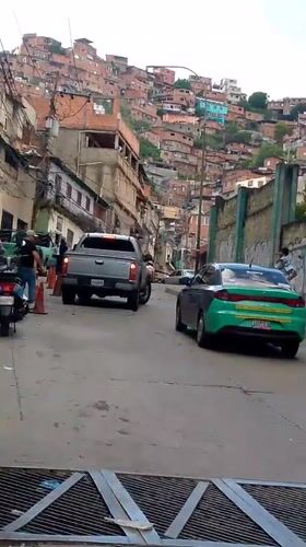 Street life and hillside neighborhoods in Caracas, El Valle