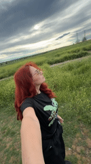 Woman takes selfie in Bulgarian flower field