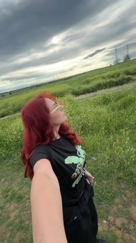 Woman takes selfie in Bulgarian flower field