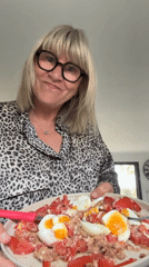 Woman prepares and presents meal in Chambœuf, France