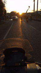 Daily life captured: sunset scooter ride, street vendor in Lhokseumawe