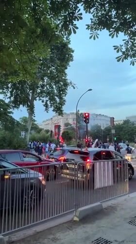 Sports fans celebrate with fireworks in Paris streets