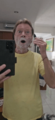 Man documents morning shave routine via selfies in Denpasar