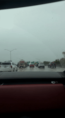 Rainy highway driving conditions captured in North Miami
