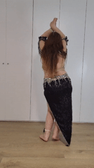 Evening cooking and belly dancing practice in Portuguese home