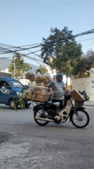 Late night street food vendors and pedestrians in Quy Nhon