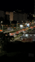 Night traffic flows through residential district in Montenegro