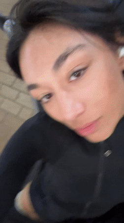 Woman documents evening travel experience through Lihue Airport, Kauai