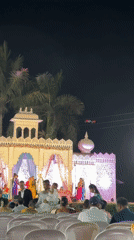 Evening wedding ceremony held outdoors in Shahapur, India