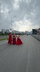 Three women in red gowns spotted in Kemerovo