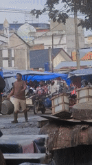 Evening fish market activity documented in Lhokseumawe, Indonesia