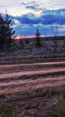 Rural dirt road documented at sunset in Otchor, Russia