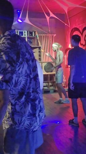 Indoor party with colored lighting documented in Nha Trang