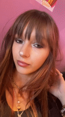 Selfie session in Raanana featuring bold nails, makeup, and jewelry