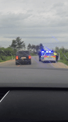 Police pull over black minivan in Aglen, Bulgaria