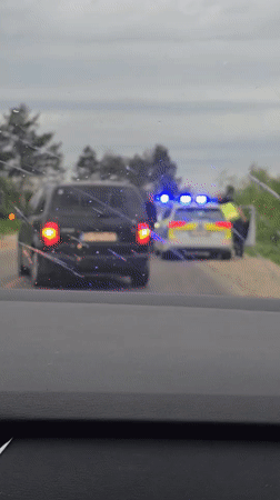 Police pull over black minivan in Aglen, Bulgaria