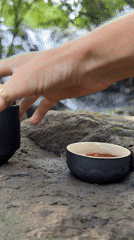 Tea ceremony captured at Selemadeg waterfall, Indonesia