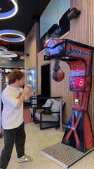 Man plays Spider-Man arcade game at cinema in Rehovot