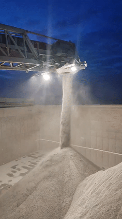 Nighttime cargo operations documented at Shcheleiki port facility