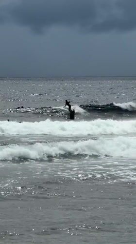 Early morning surfing session documented in General Luna, Philippines
