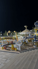 Chinarkent's riverfront park and promenade lit up at night