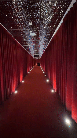 Bold art and velvet hallways inside a theatrical Dubai interior