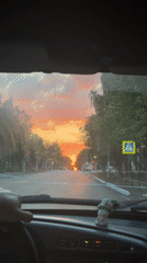 Street drummer performs in Chaikovsky park during sunset hour