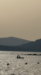 Late afternoon at the Alghero coast, swimming and sun.