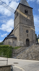Stone village and green countryside in rural Belgian Ardennes