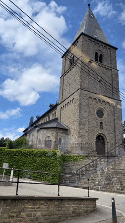 Stone village and green countryside in rural Belgian Ardennes