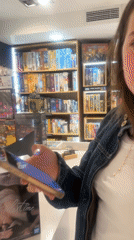 Woman shops for Yu-Gi-Oh cards in Yerevan store