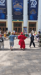 Outdoor craft market with traditional dancing held in Dubna