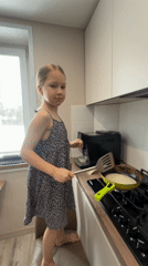 Young girl cooks pancakes, plays with pet rats outdoors