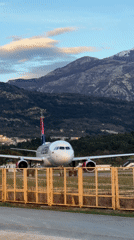 Aircraft observed over Montenegro's Bay of Tivat during sunset