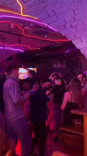 Dancing captured at neon-lit Saratov bar Friday evening