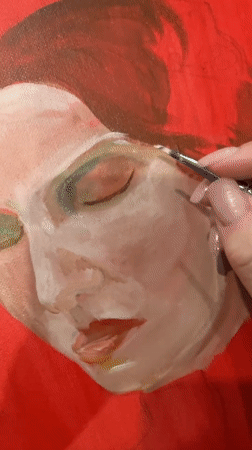 Artist creates portrait painting in Gelendzhik studio session