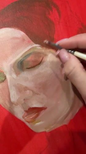 Artist creates portrait painting in Gelendzhik studio session