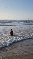 Families enjoy sunny Saturday afternoon at Tel Aviv beach