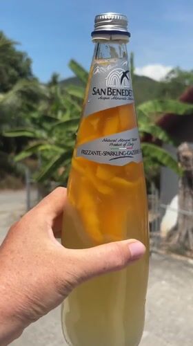 Sparkling water with fruit slices observed in Thailand
