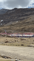 Hikers trek Mount Kailash pilgrimage route in early morning
