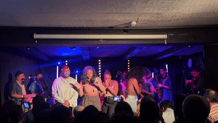 Live music performance features dancers, drummers in central London