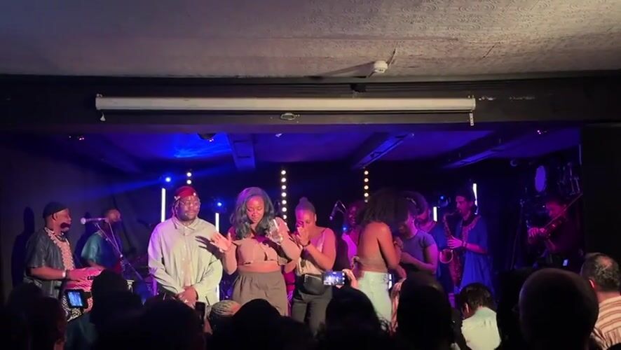 Live music performance features dancers, drummers in central London