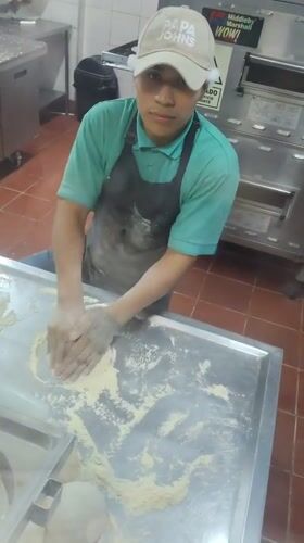 Late-night pizza preparation observed at Barranco Papa John's location