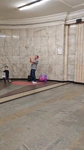 Trumpet in a corridor, then out on the river