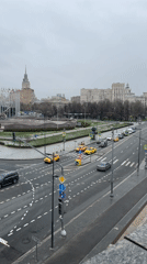 Morning bridge views capture overcast Moscow cityscape with river