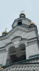 Families visit Orthodox church in Votkinsk, Russia Sunday morning