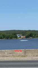 Woman documents sunny waterfront visit in Russia's Volga region