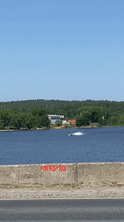 Woman documents sunny waterfront visit in Russia's Volga region